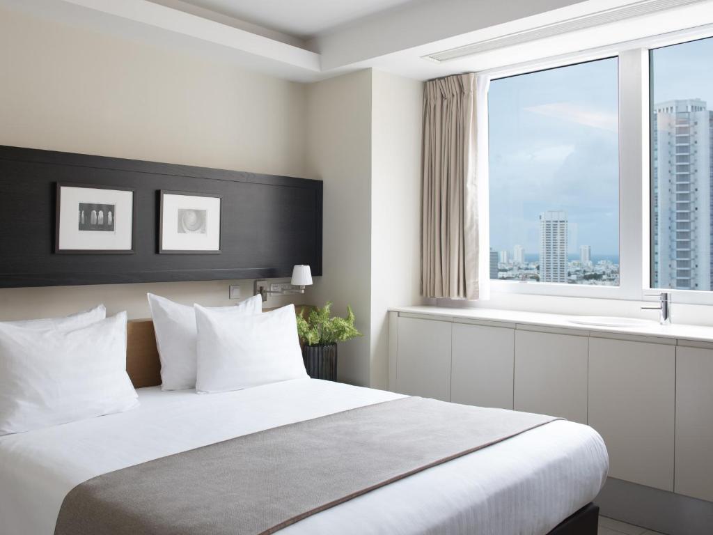 Postel nebo postele na pokoji v ubytování Vital - Urban boutique hotel TLV