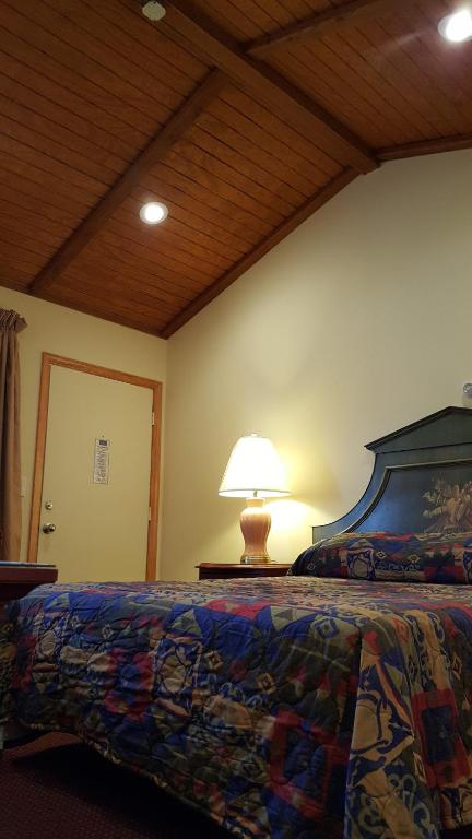 Postel nebo postele na pokoji v ubytování Atlantic Motel