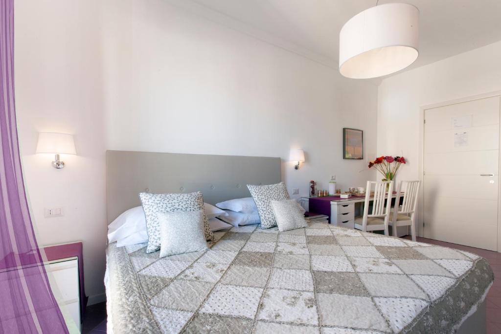 Posteľ alebo postele v izbe v ubytovaní A Sorrento B&B