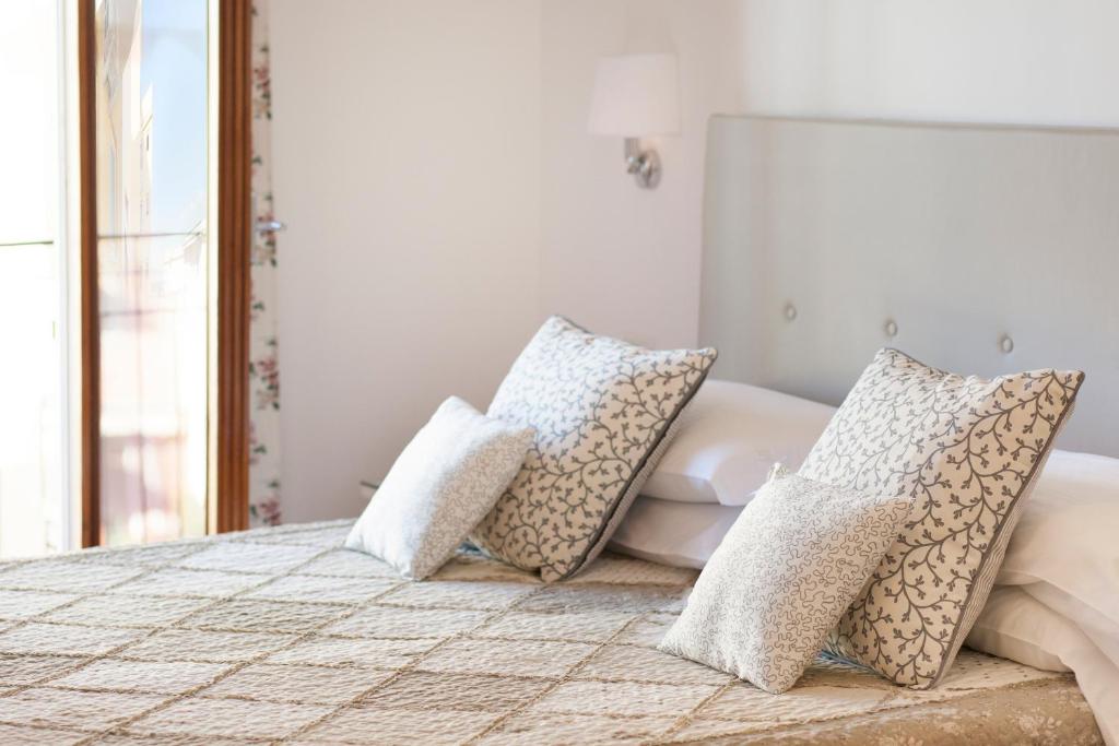 Posteľ alebo postele v izbe v ubytovaní A Sorrento B&B