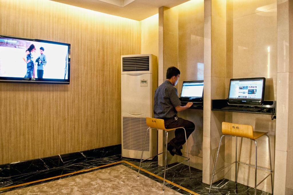 TV a/nebo společenská místnost v ubytování Grand Sakura Hotel