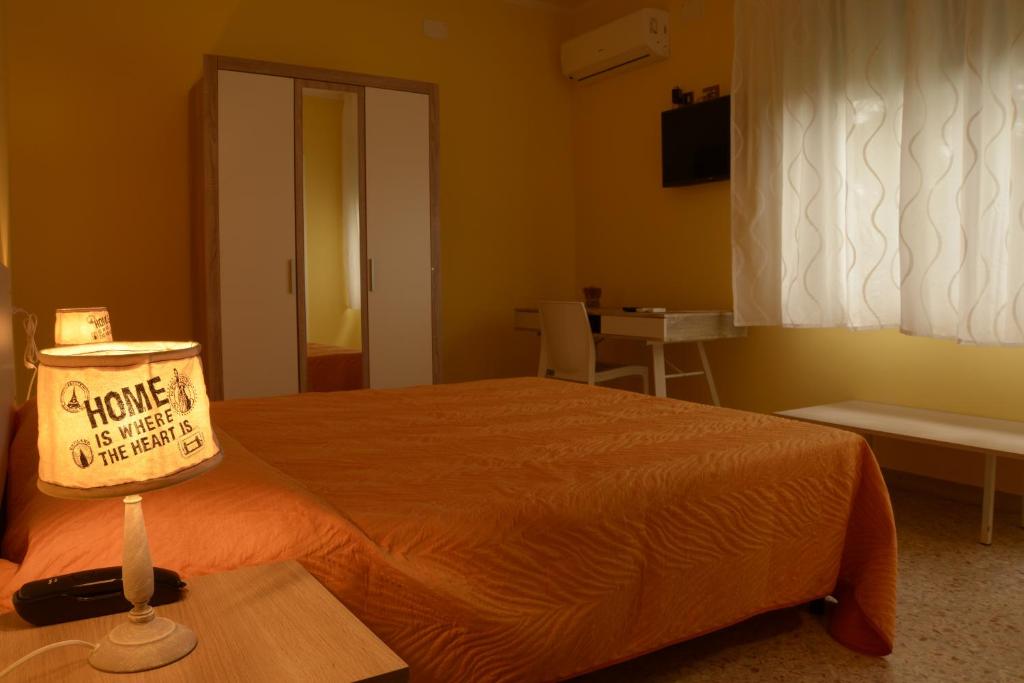 Postel nebo postele na pokoji v ubytování A1 Girasole B&B