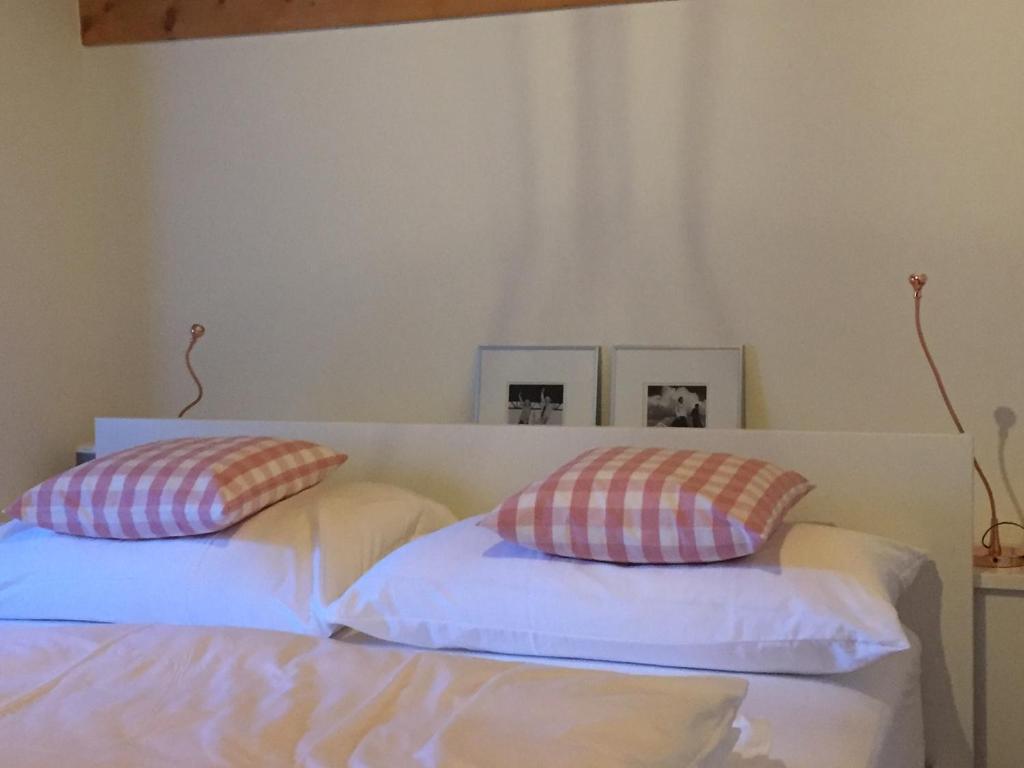 Postel nebo postele na pokoji v ubytování Ferienhaus Grüner Heinrich