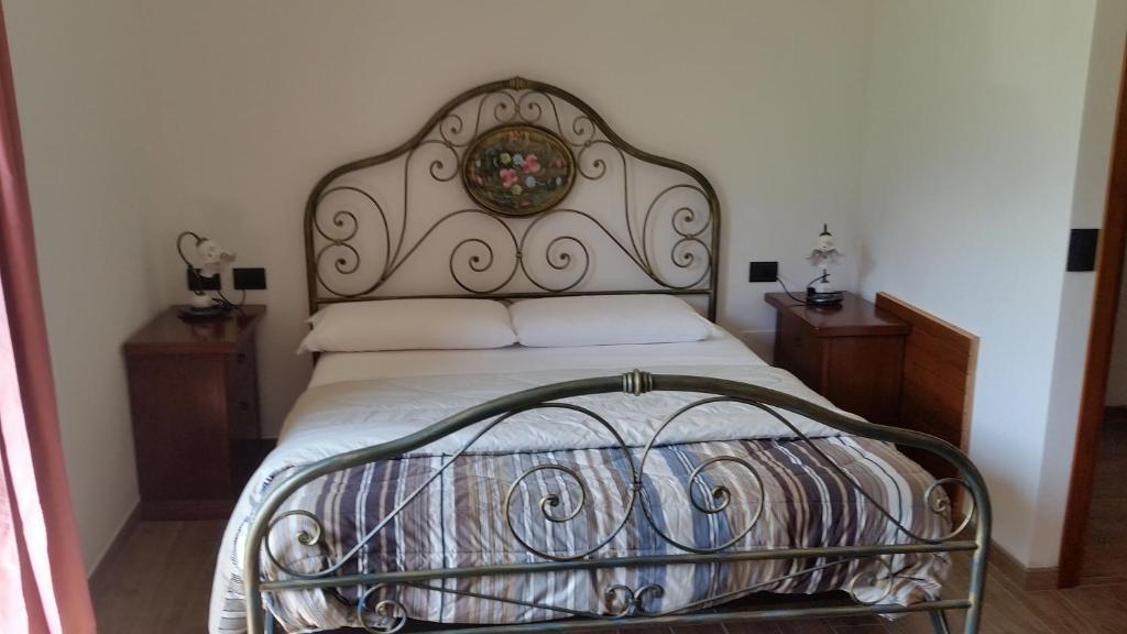 Postel nebo postele na pokoji v ubytování Agriturismo Nona Rosa