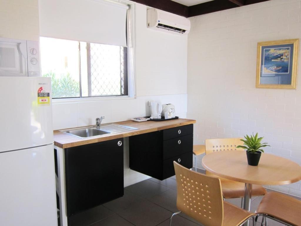 Kuchyň nebo kuchyňský kout v ubytování Horizons Motel