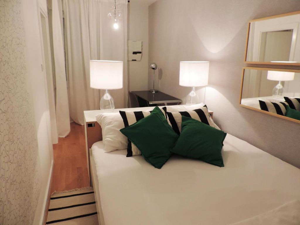 Posteľ alebo postele v izbe v ubytovaní Hella Apartment