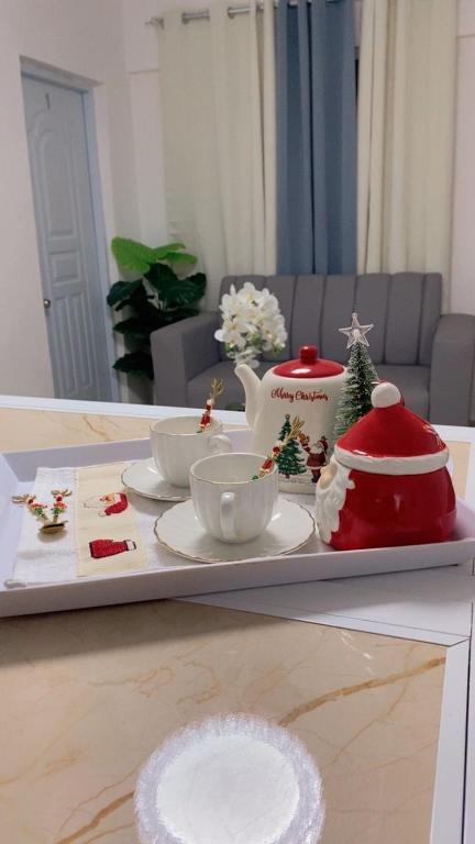 a tray with christmas decorations on a table at Boutique Hotel in Pedernales