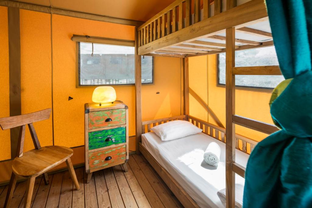 Postel nebo postele na pokoji v ubytování Casa Tuia Resort