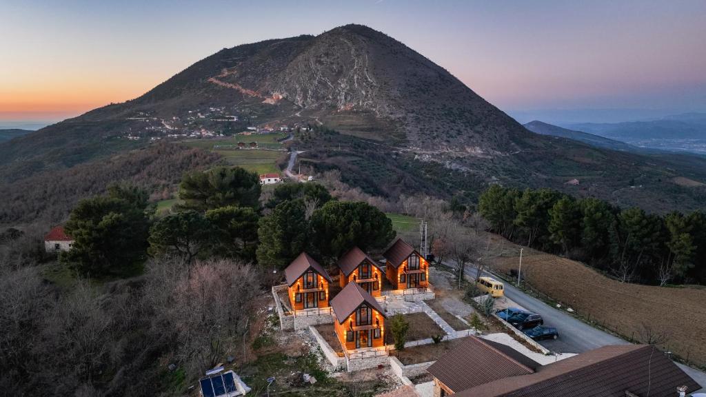 an aerial view of a house in front of a mountain at Sinja Park Villas in Sinjë