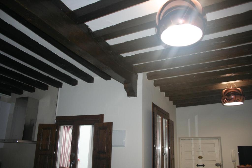 Televízia a/alebo spoločenská miestnosť v ubytovaní Apartamento Tres Culturas
