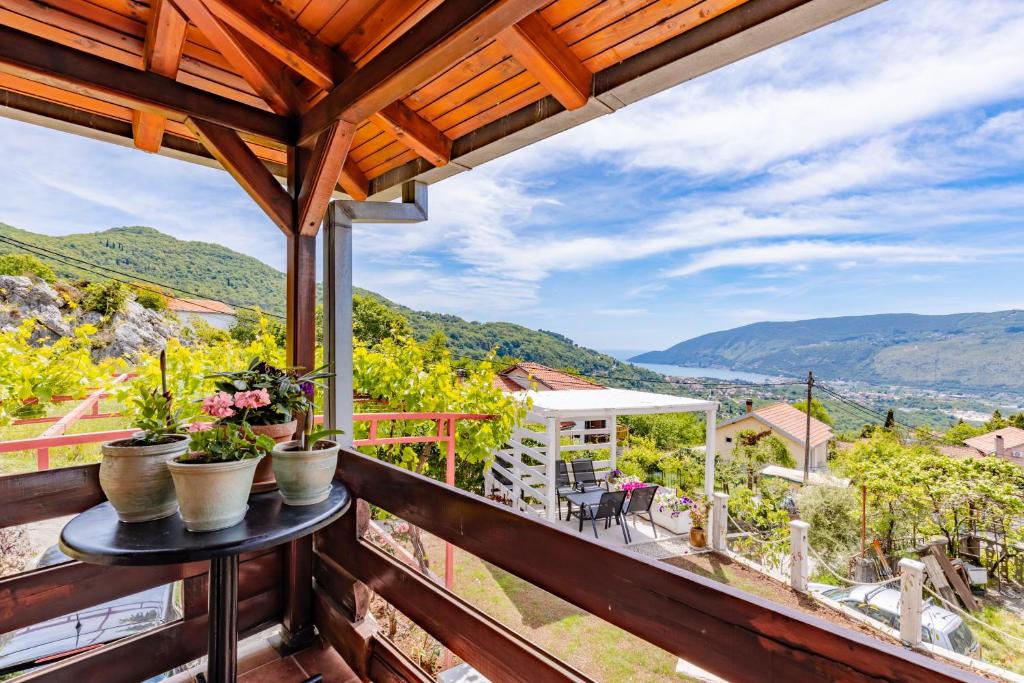 a view from the balcony of a house at Seaview Chalet in Herceg-Novi