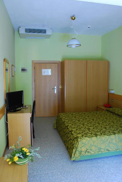 Кровать или кровати в номере Hotel Stella Maris