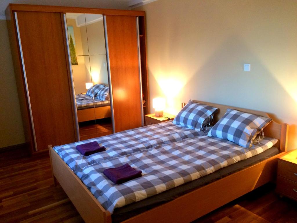 Postel nebo postele na pokoji v ubytování Apartment and rooms Maraton