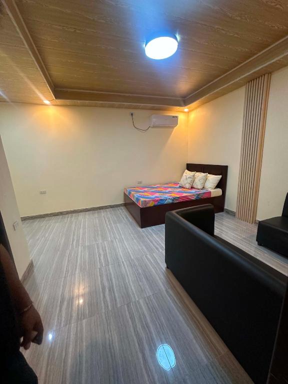 a room with a bed and a couch in it at Zari zara Apartment in San Simon