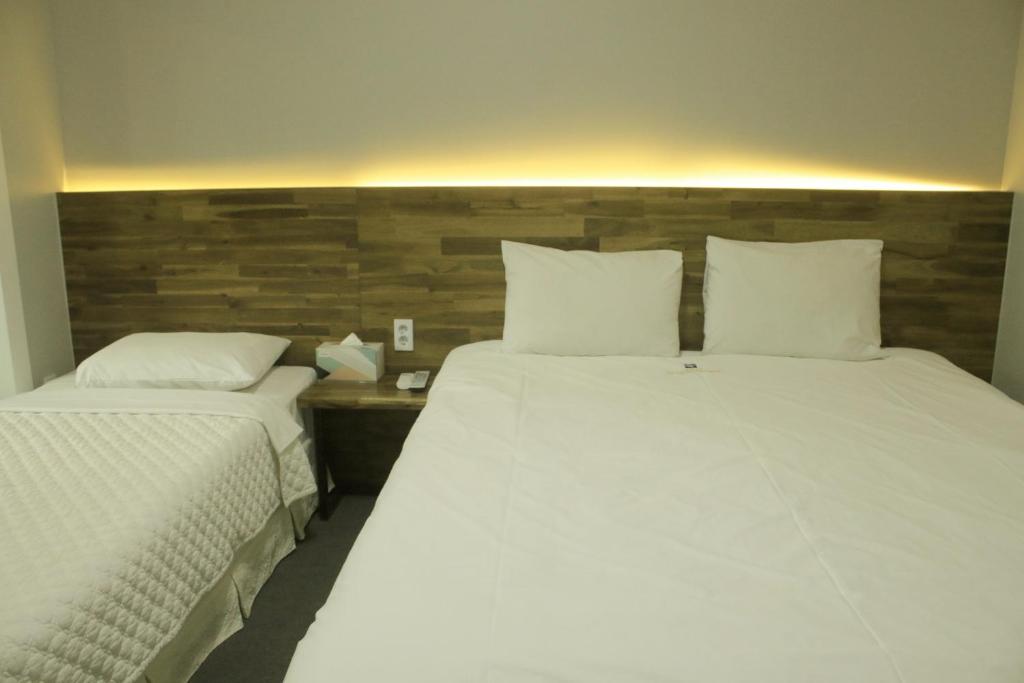Postel nebo postele na pokoji v ubytování Hotel Ocean View
