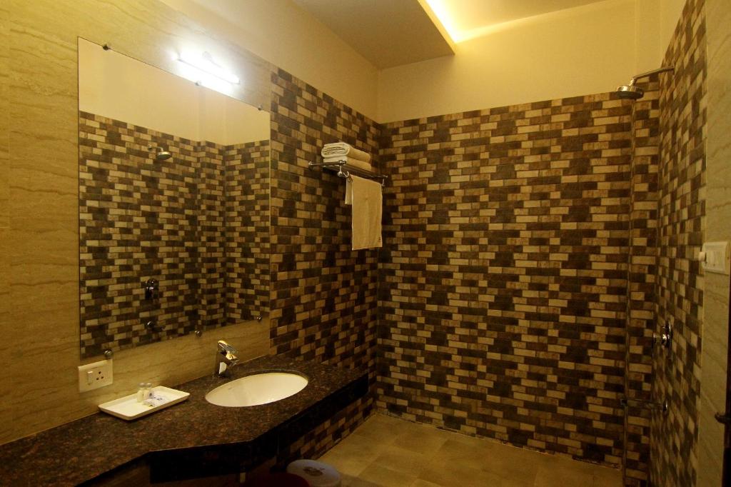 Koupelna v ubytování Hotel Rivera Palace