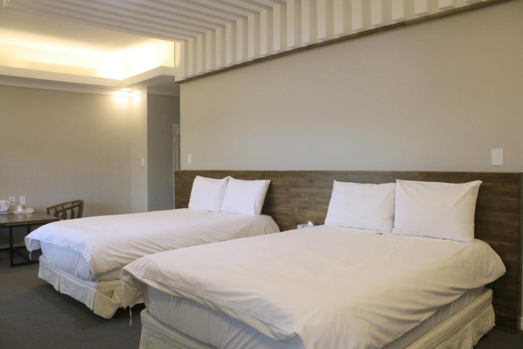 Postel nebo postele na pokoji v ubytování Hotel Ocean View