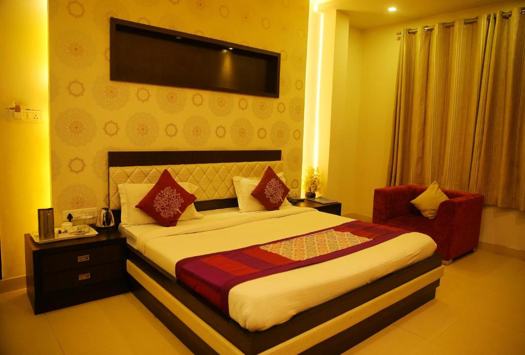 מיטה או מיטות בחדר ב-Hotel Rivera Palace
