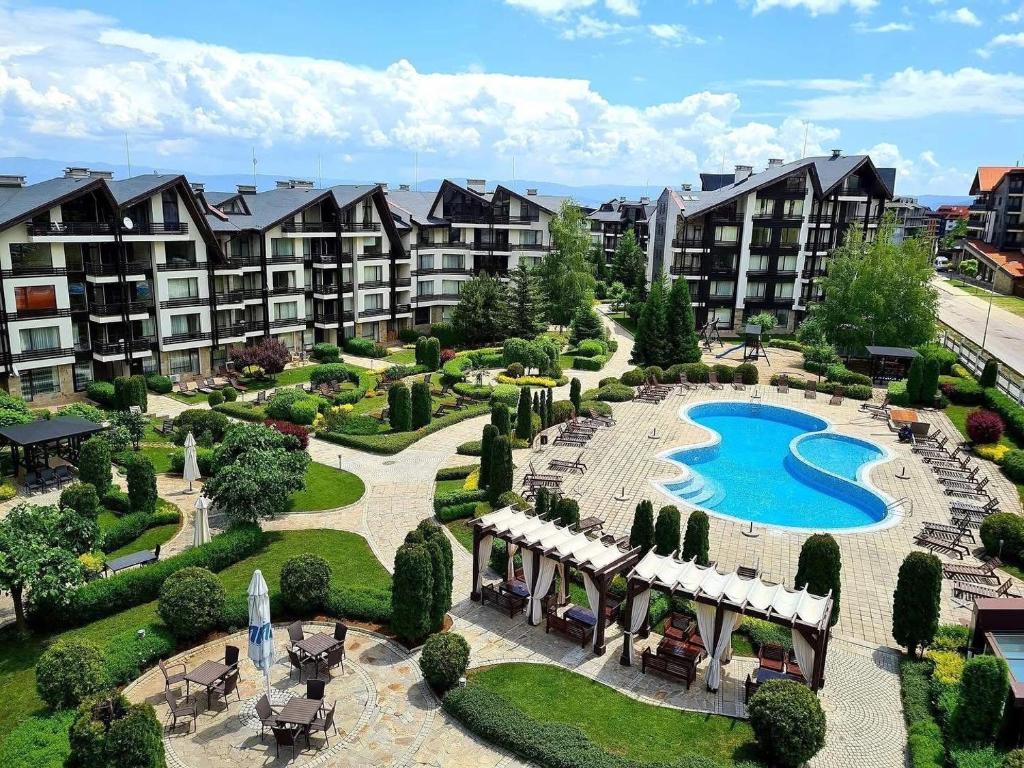 an aerial view of an apartment complex with a swimming pool at Bansko Aspen Relax & Chill in Bansko