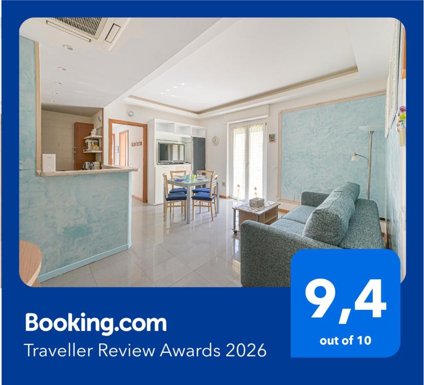 a living room with a couch and a table at Casa Norb Lerici - with Private Parking in Lerici
