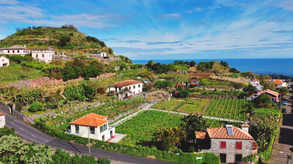 an aerial view of a village on a hill at Solar Arco de São Jorge in Santana