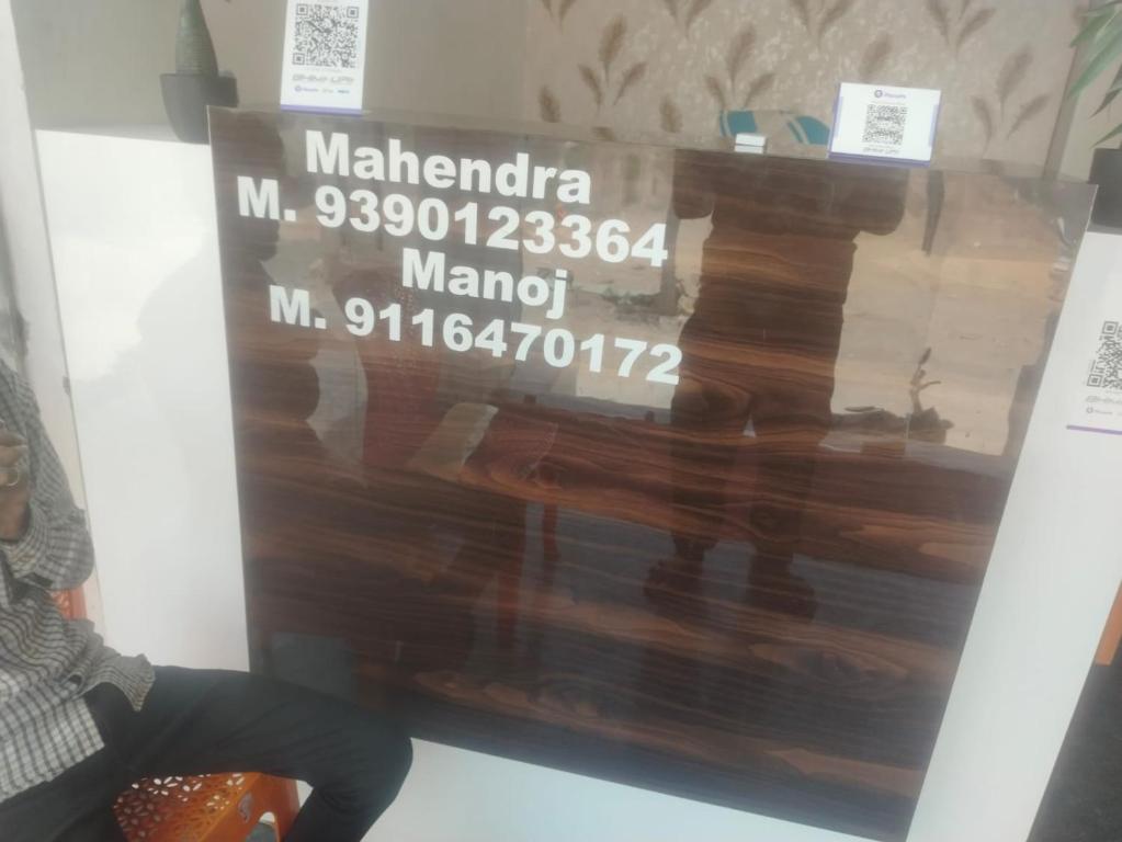 a sign for a piano in a room at OM DAYAMA Please in Khātu