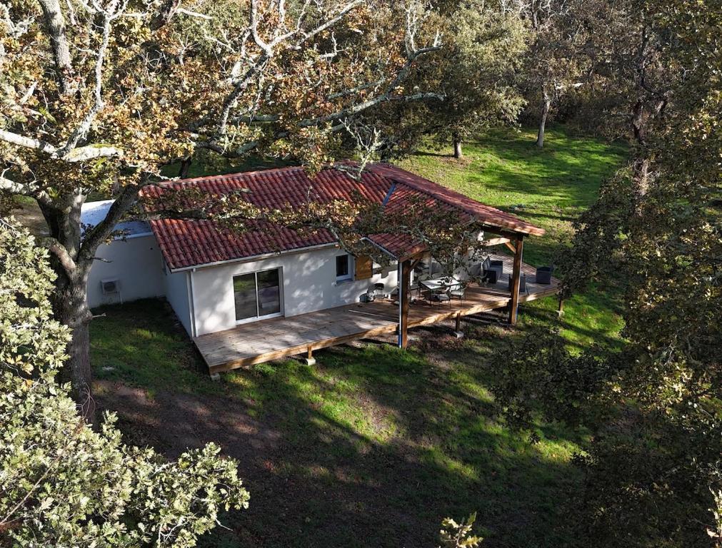 an aerial view of a house with a deck at L'Airial du moulin in Parentis-en-Born
