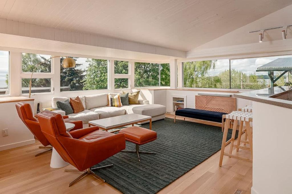 a living room with a couch and a table at Crows Nest Condo 3BR Downtown in Anchorage