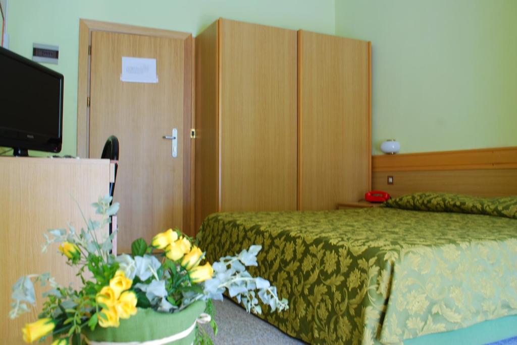 Кровать или кровати в номере Hotel Stella Maris
