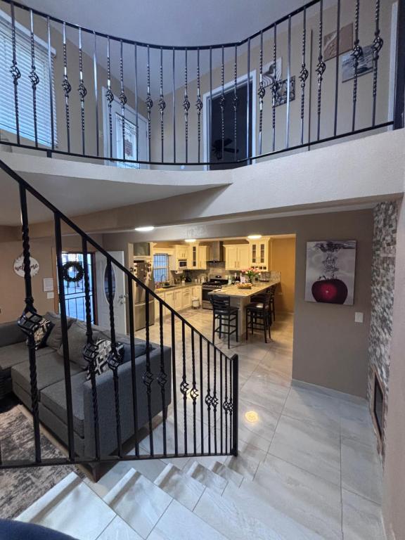 a staircase leading to a living room and a kitchen at Casa Rosarito beach in Rosarito Beach