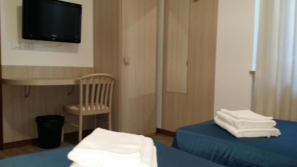Postel nebo postele na pokoji v ubytování Flying Hotel