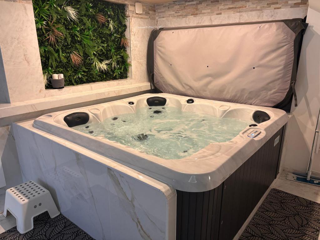 a jacuzziificialificialificialificialificialificialificialificialificialificialificial at Spa Jacuzzi Moon White in Vaudherland