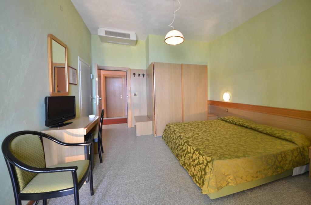 Кровать или кровати в номере Hotel Stella Maris