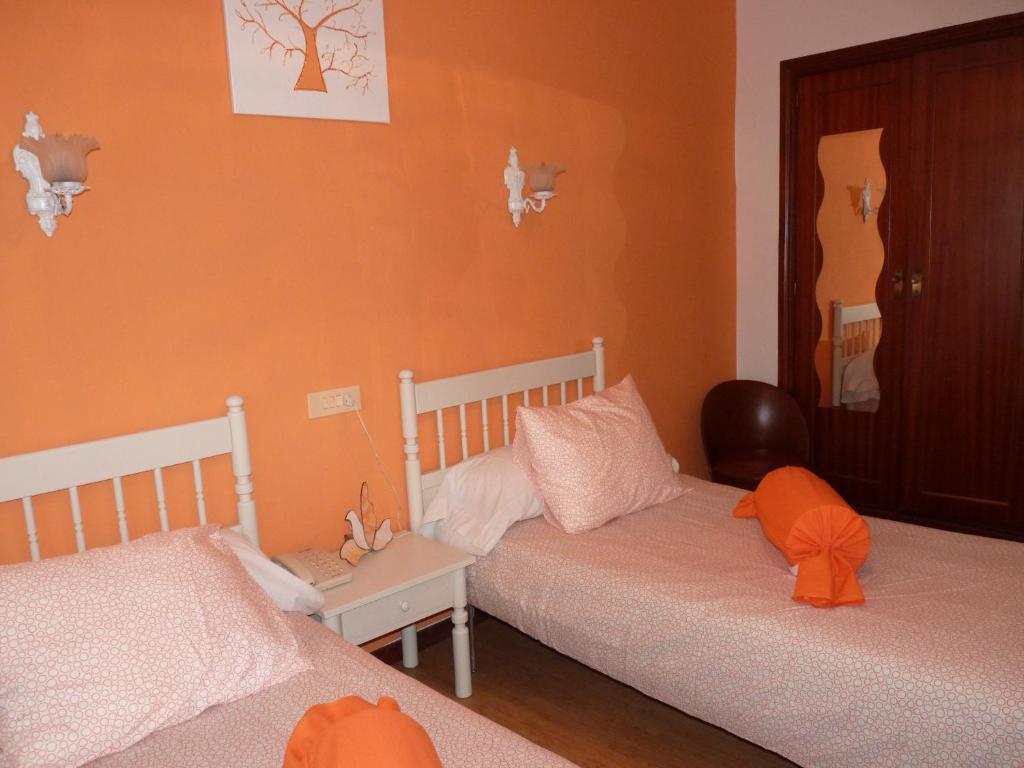 Postel nebo postele na pokoji v ubytování Hotel España