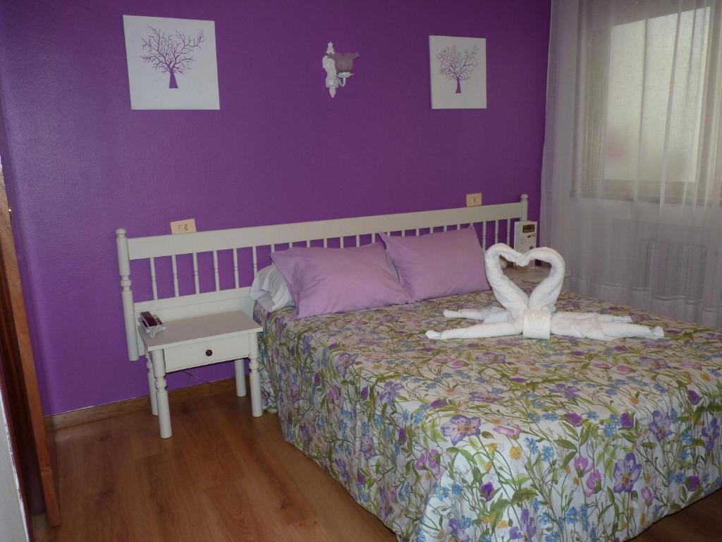 Postel nebo postele na pokoji v ubytování Hotel España