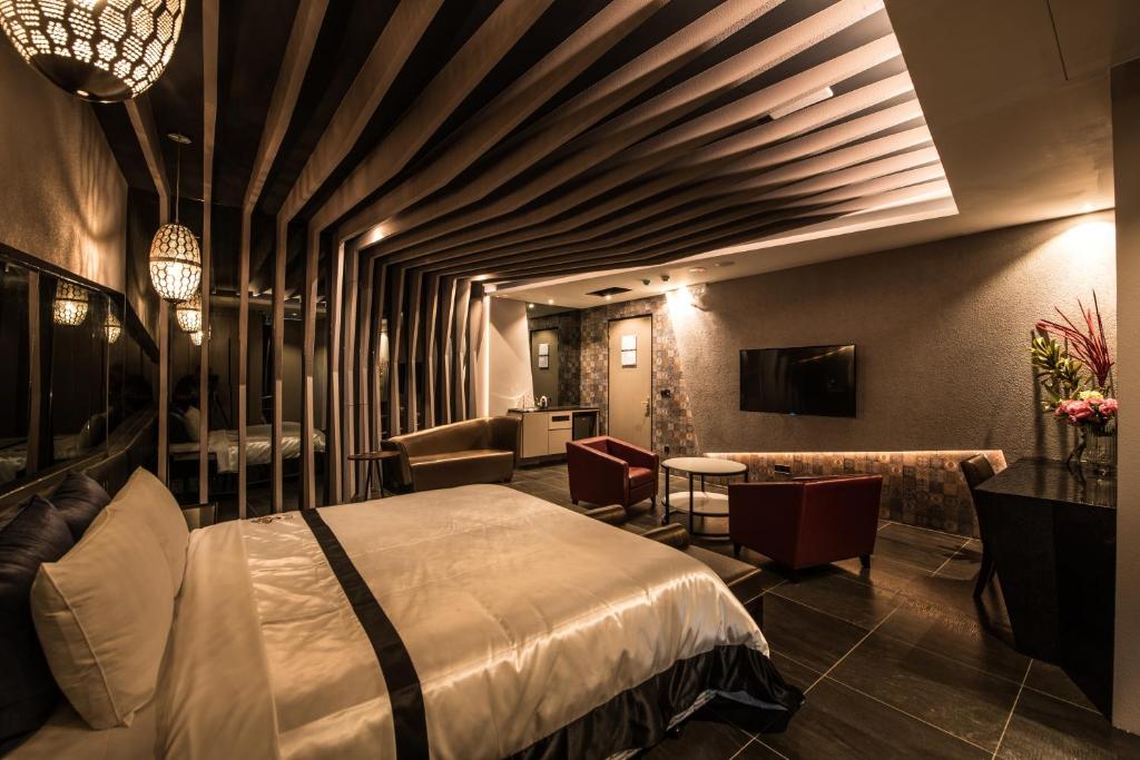 Postel nebo postele na pokoji v ubytování Voga Motel