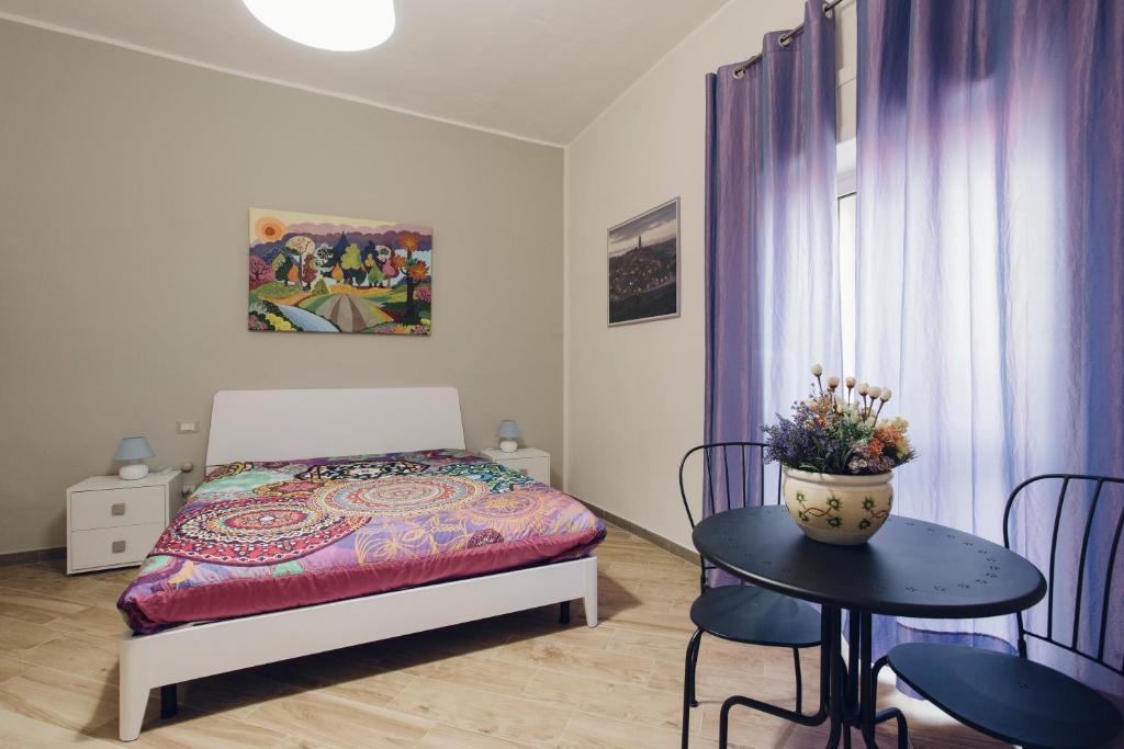 Postel nebo postele na pokoji v ubytování Il Fiore dei Sassi