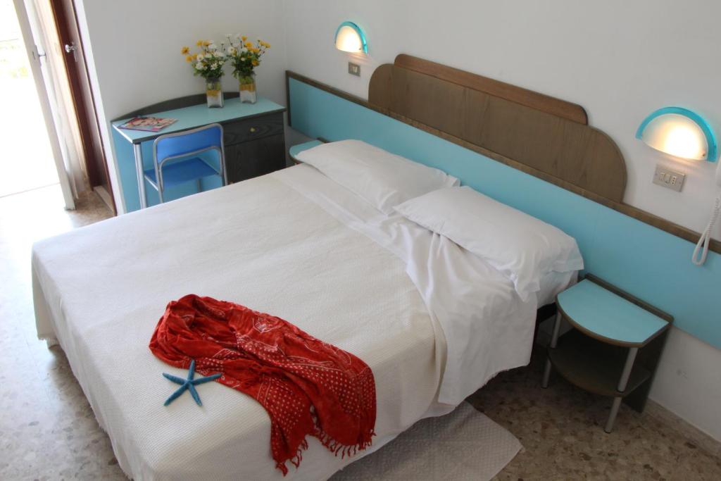 Postel nebo postele na pokoji v ubytování Hotel Confort