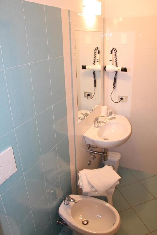 Koupelna v ubytování Hotel Confort