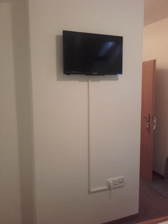 TV a/nebo společenská místnost v ubytování Hotel Anna
