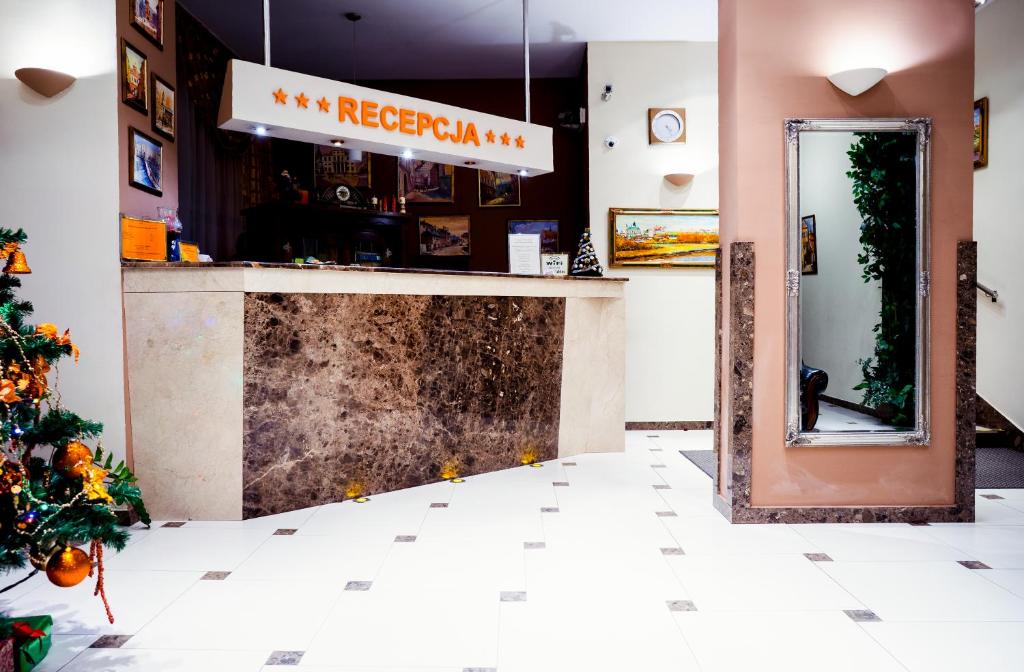 Kuchyňa alebo kuchynka v ubytovaní HotelsLublin