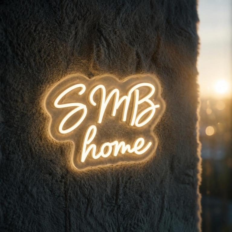 a neon sign that says rm home on a wall at SMB home PANORAMA in Oradea