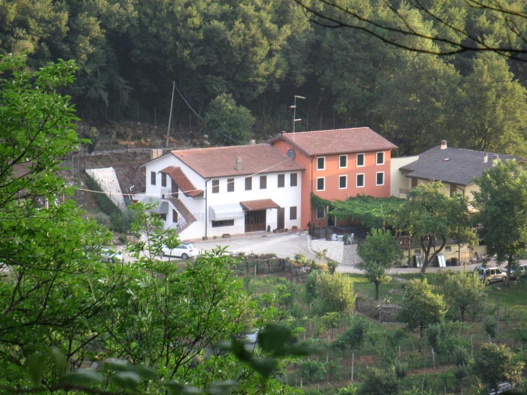 a group of buildings with trees in the background at Colli Berici in Arcugnano