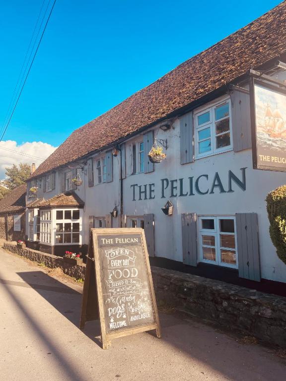 a building with a sign in front of it at The Pelican Inn in Stapleford