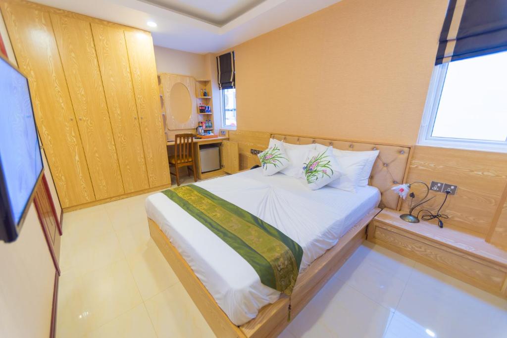 Postel nebo postele na pokoji v ubytování Hathaa Beach Maldives