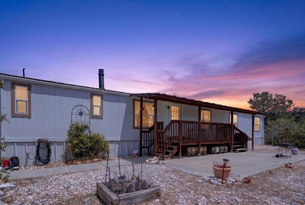 a house with a porch and a patio at Tehachapi 12-Guest Group Escape home in Tehachapi