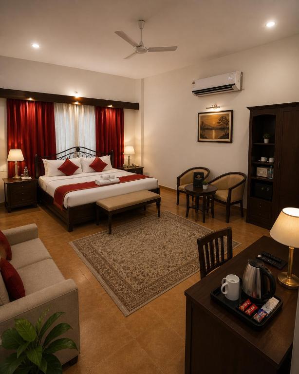 a bedroom with a bed and a living room at Chillout Villa in Wada