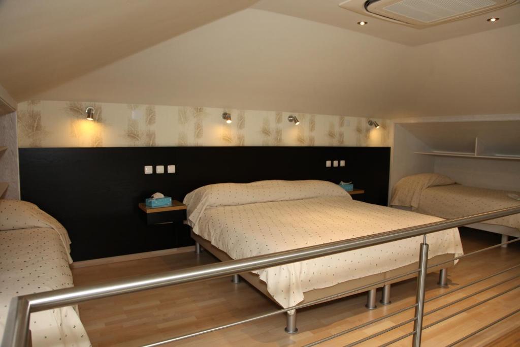 Cama o camas de una habitación en Quinta Lagarça 57