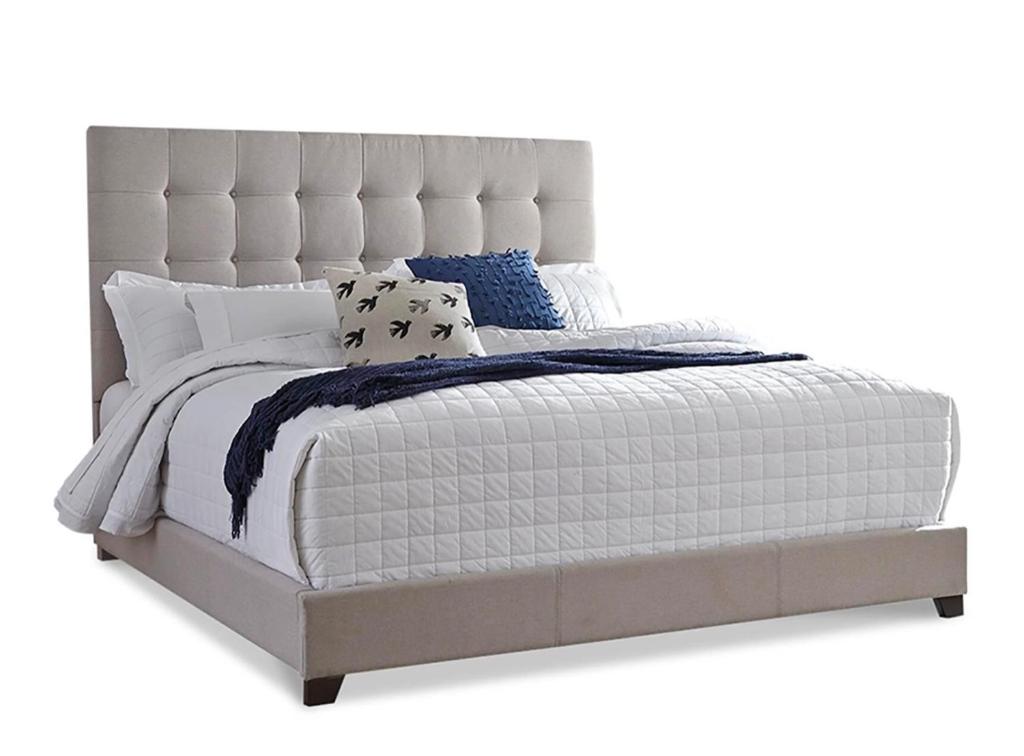 a bed with a white bed frame and pillows at EdCccc life in Las Vegas