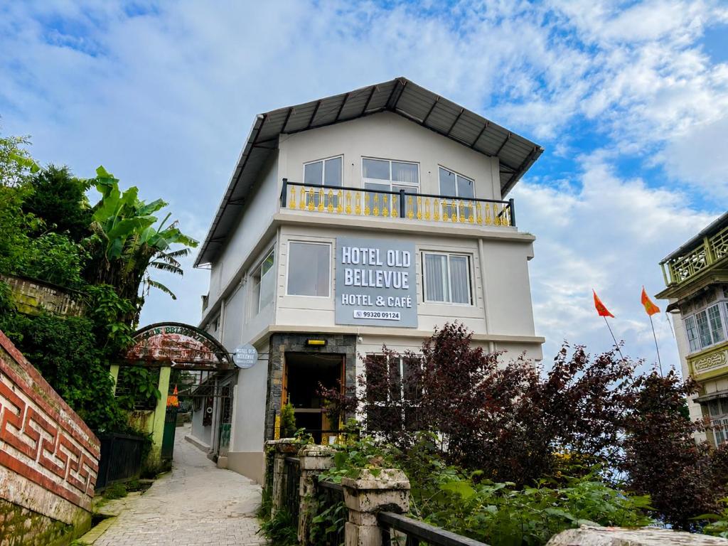 a building with a sign that reads hotel ape behiba at Hotel Old Bellevue Heritage Stay with Mountain Views in Chowrasta Darjeeling in Darjeeling
